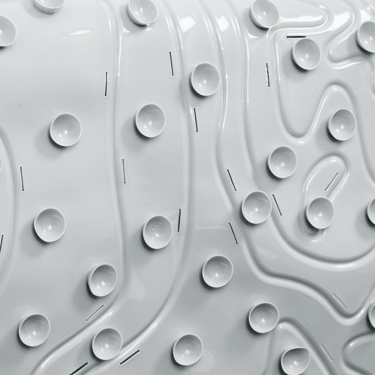 Boon Griffle textured surface enhancing grip during bath