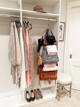 Boottique heavy‑duty chrome organizer holds up to 50 lbs of bags.