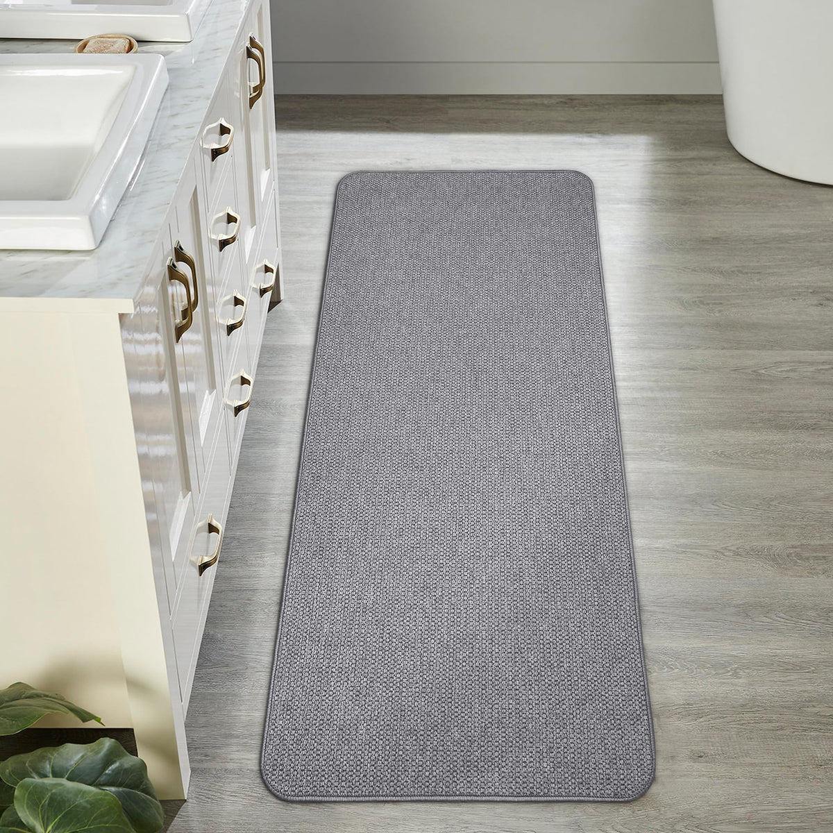 Bosap gray mat with non-slip backing on wet tile