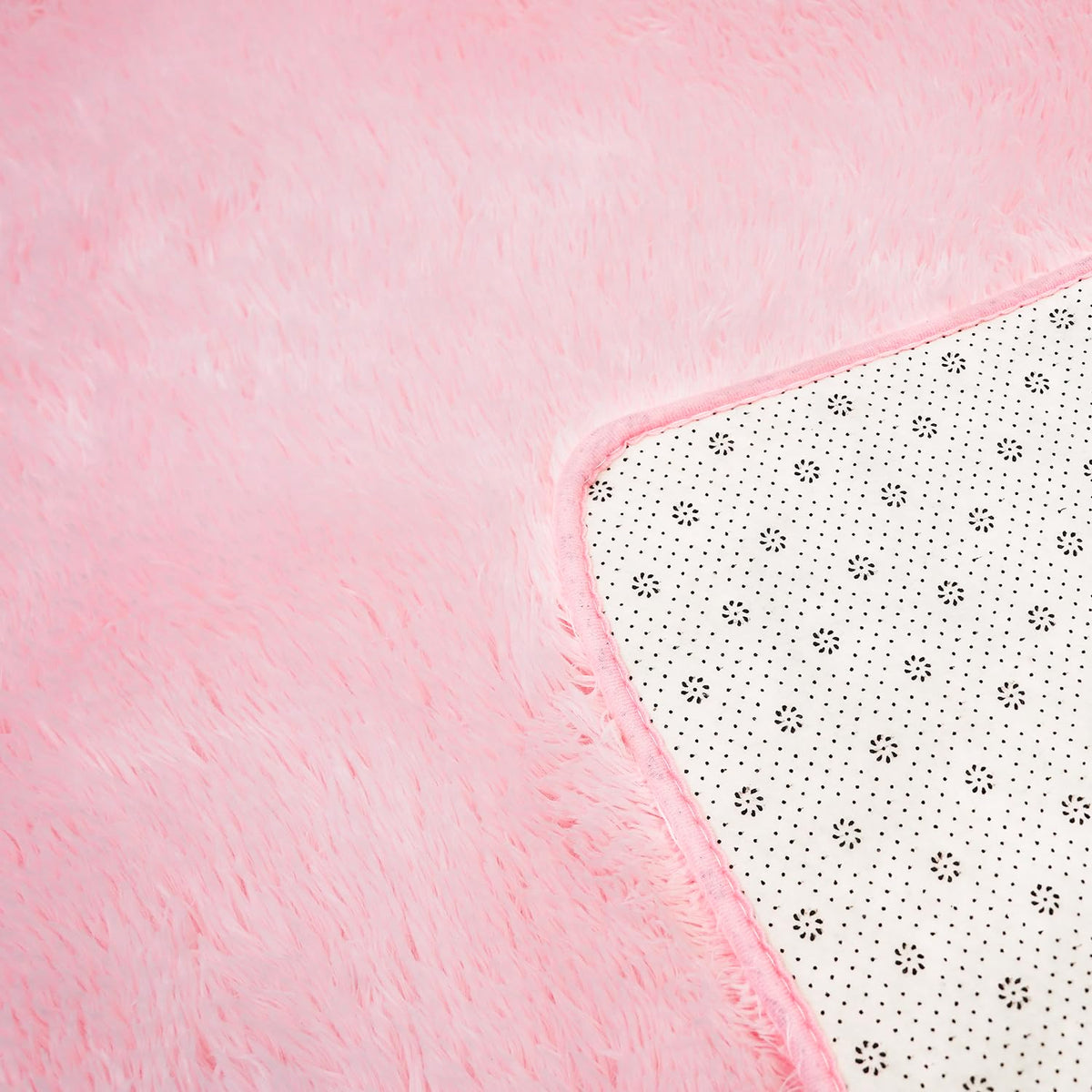 Boshengya easy-clean pink shag rug vacuum or gentle wash.