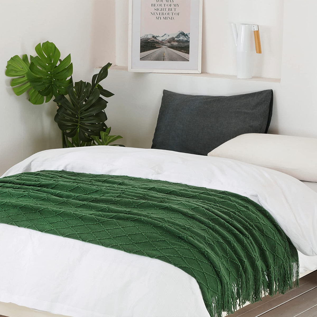BOURINA knit textured pattern blanket adds tactile decor to room.