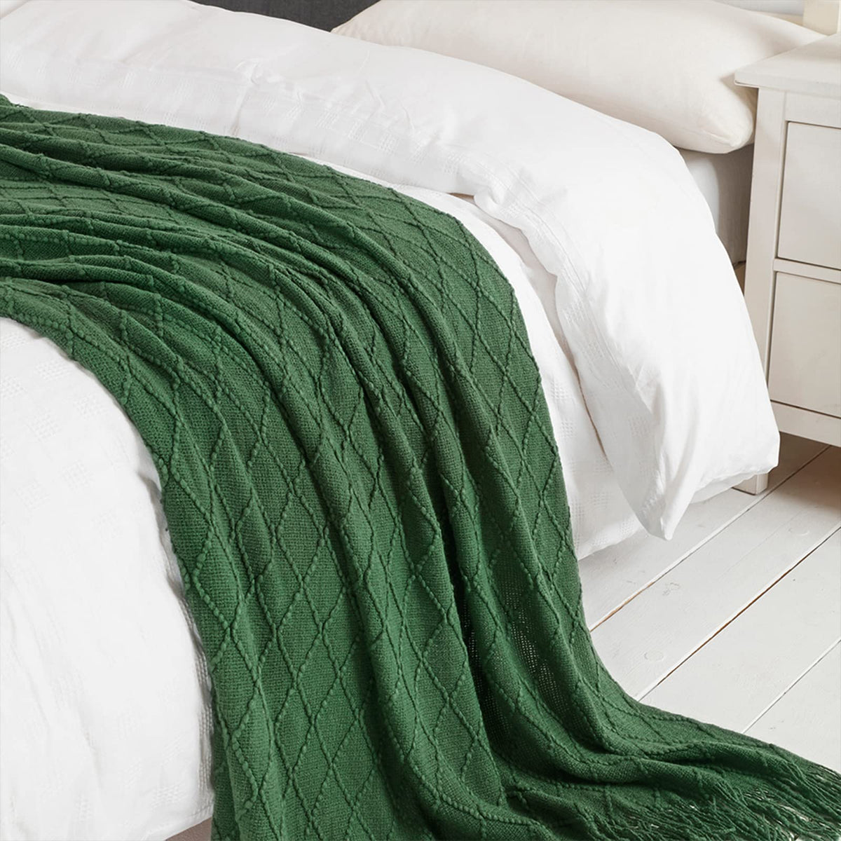 BOURINA rolled fringed edges blanket with polished finish for style.