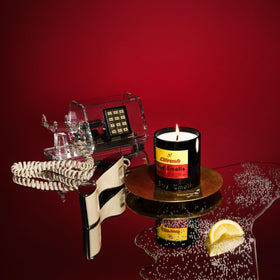 Boy Smells Citrush candle glass jar shown as modern decor piece.
