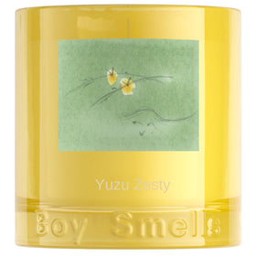 Boy Smells Yuzu Zesty candle bottle shows bright citrus notes for a refreshing ambiance.
