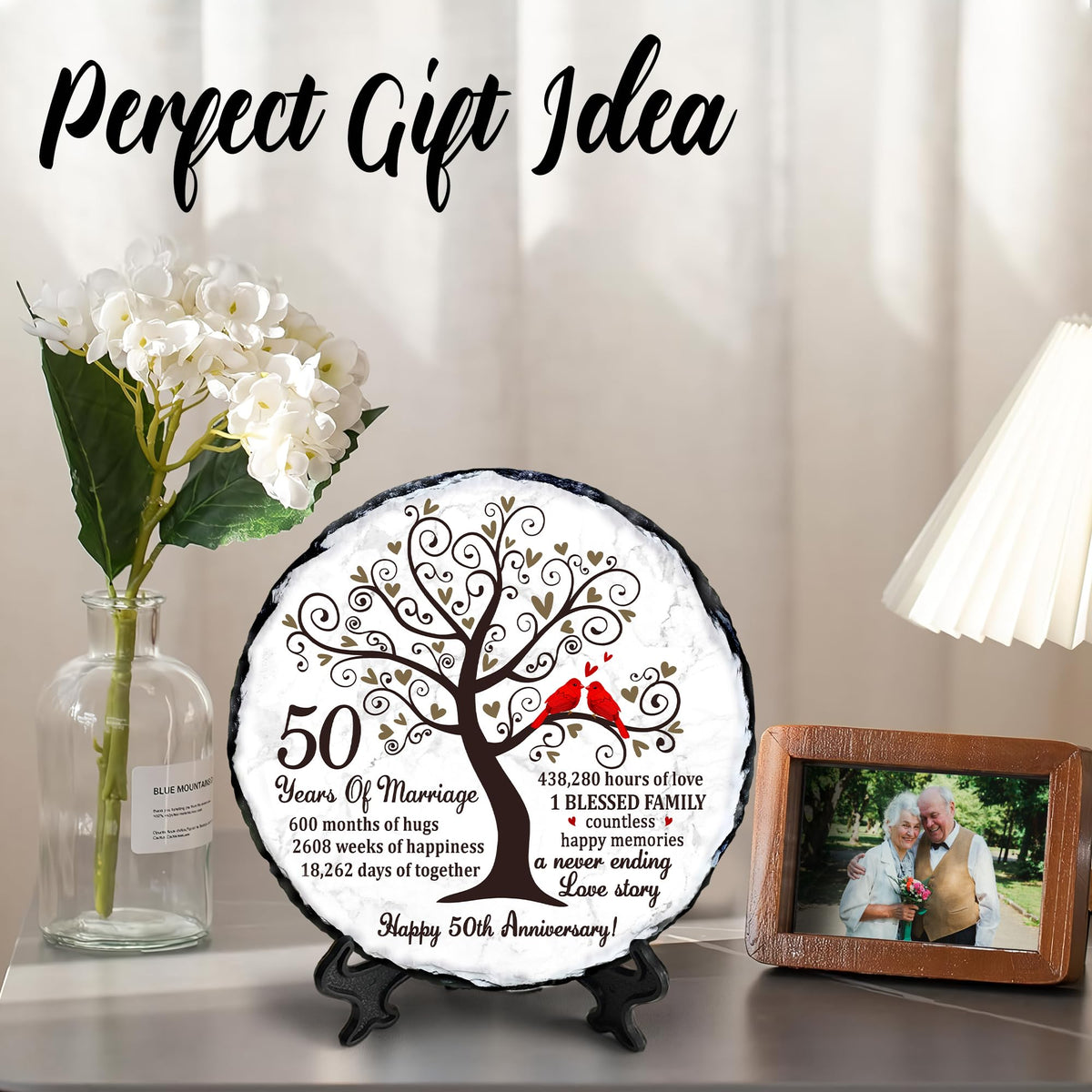 Bozspacer Golden Couple slate plate in a garden setting for outdoor display