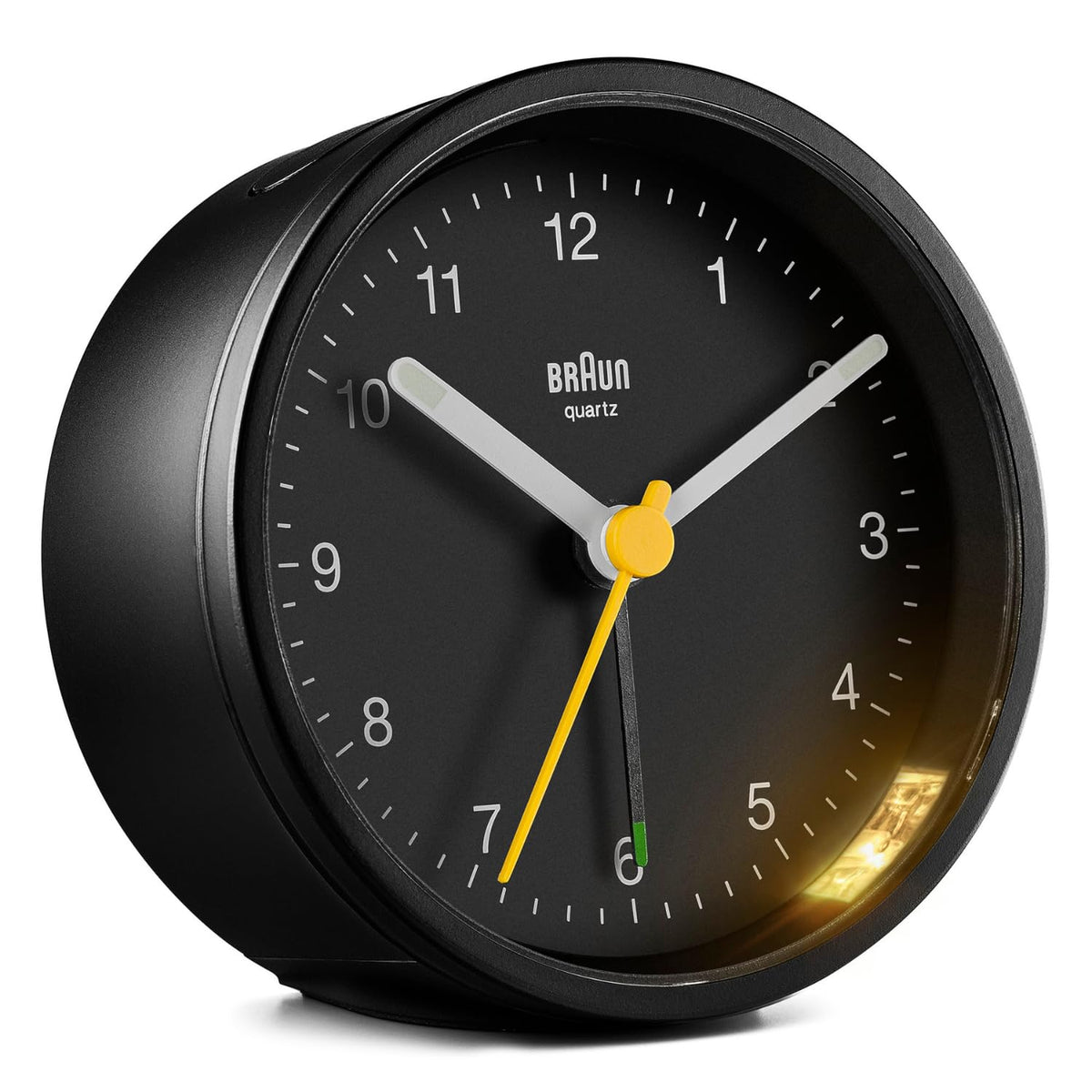 Braun Classic analogue alarm clock dial close-up for easy at-a-glance reading.