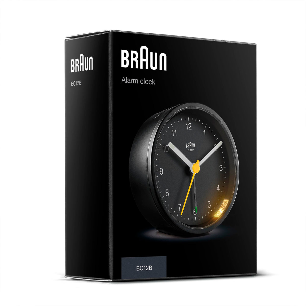 Front view of Braun clock on a nightstand with clean lines.