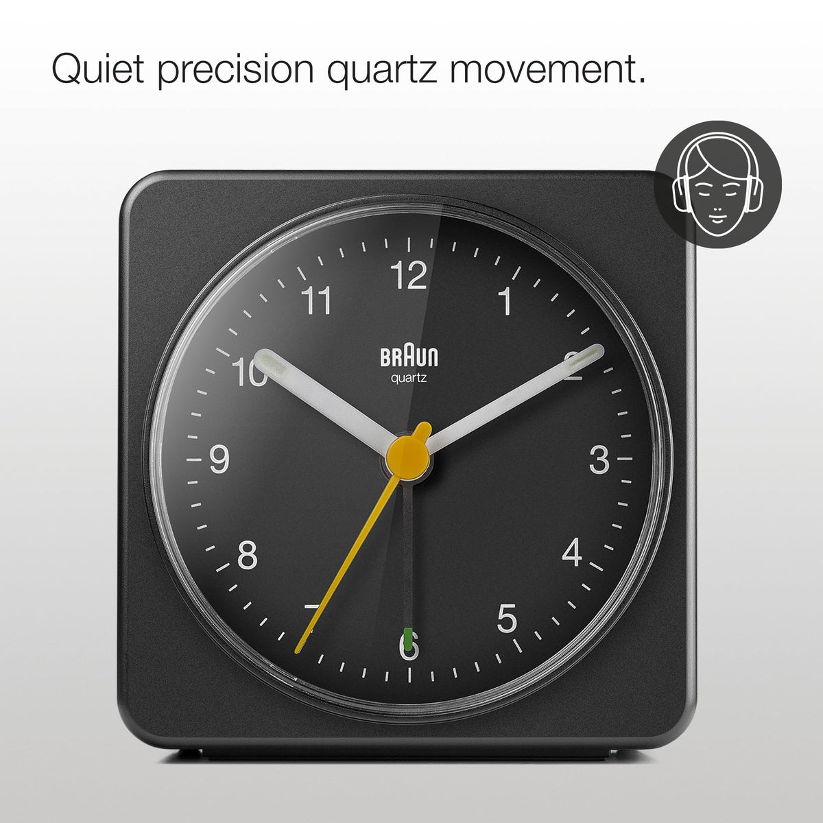 Braun clock's yellow second hand adds quick visibility during night checks.
