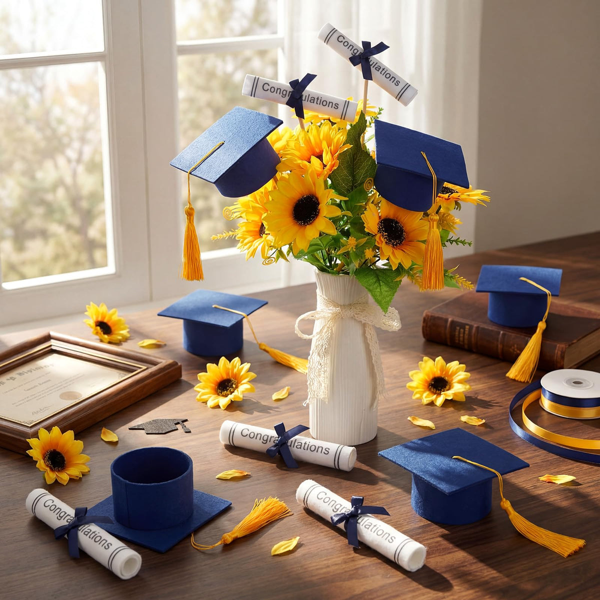 Breling blue and gold grad decor enhances photo booths and dessert tables.