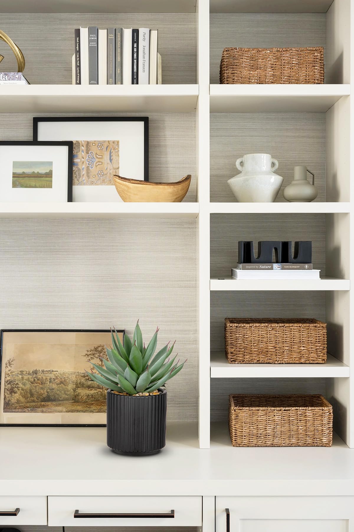 Briful artificial agave faux plant in a black basin adds contemporary charm.