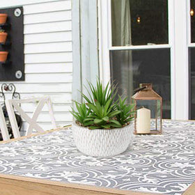 Briful artificial succulent in desk display pot offers low-maintenance greenery.