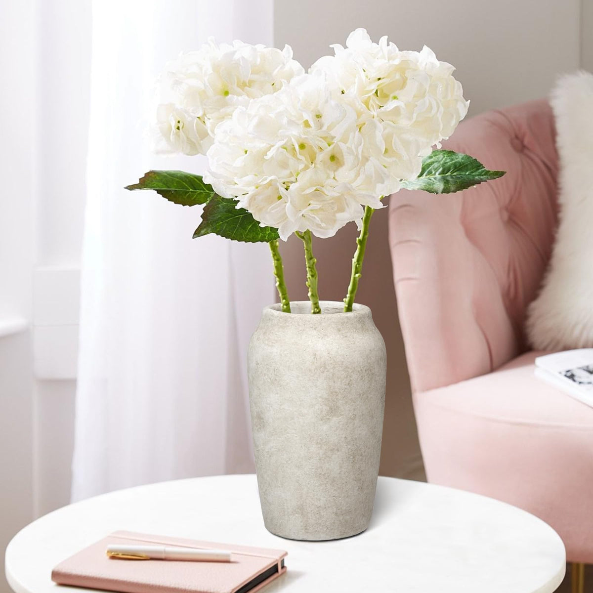 Briful beige vase encourages natural stems for balanced arrangements.