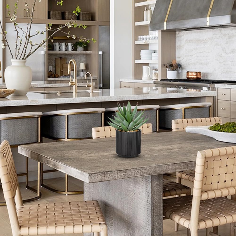 Briful faux agave by entryway enhances welcoming decor.
