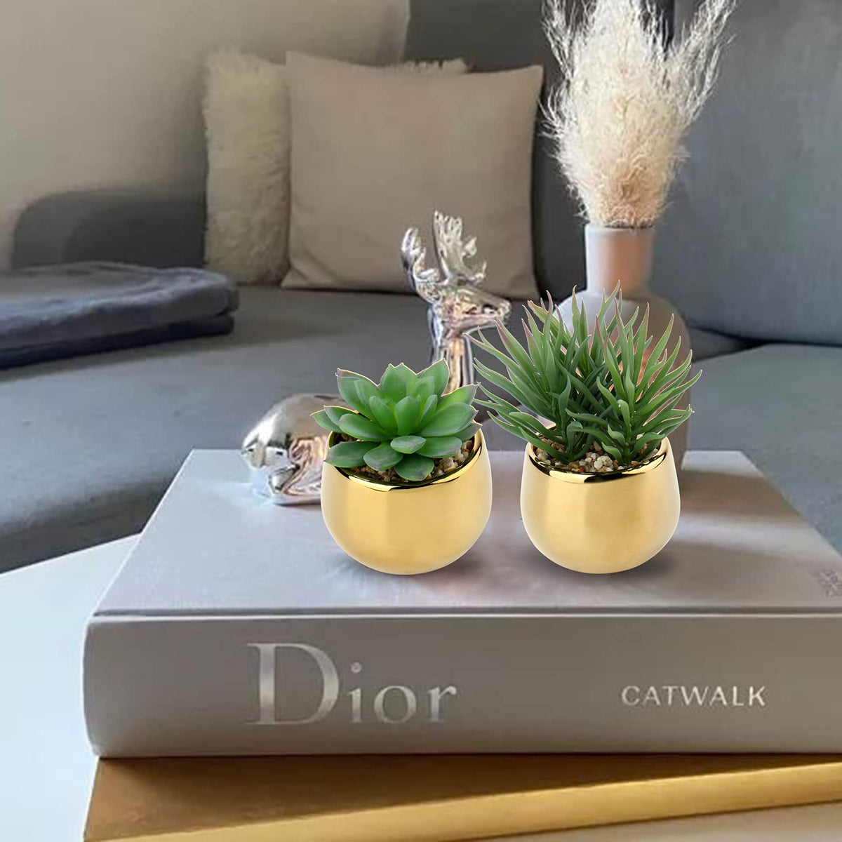 Briful realistic faux succulents in gold pots add low-maintenance style to shelves