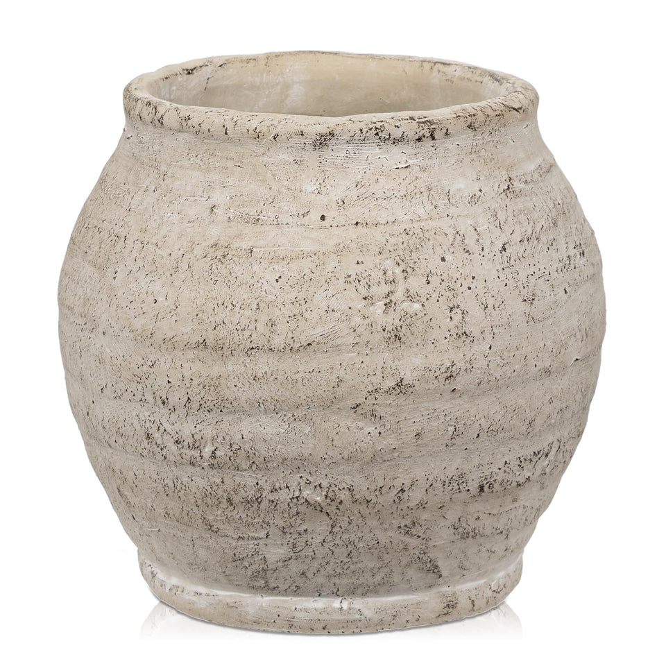 Briful rustic vase closeup shows distressed texture for warm decor accents.