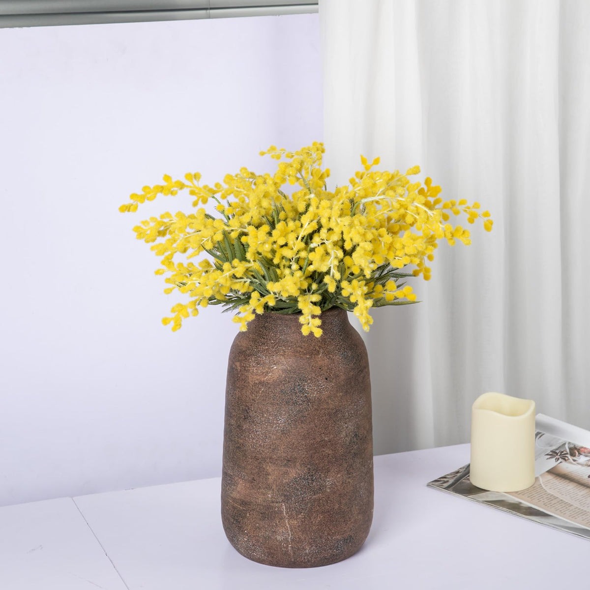 Briful vase on a shelf demonstrates slim profile ideal for narrow spaces.