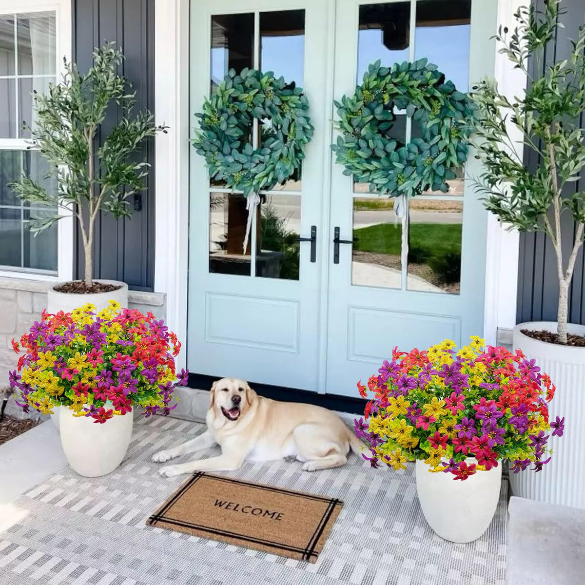 BRIGEA vase display of artificial flowers in a living space showcases lush maintenance-free beauty
