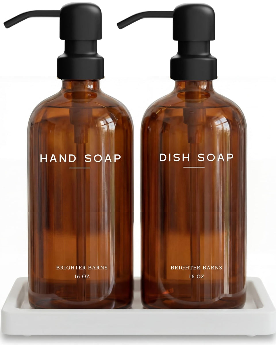 Brighter Barns amber glass dispenser set with pumps for stylish, reusable hand soap.