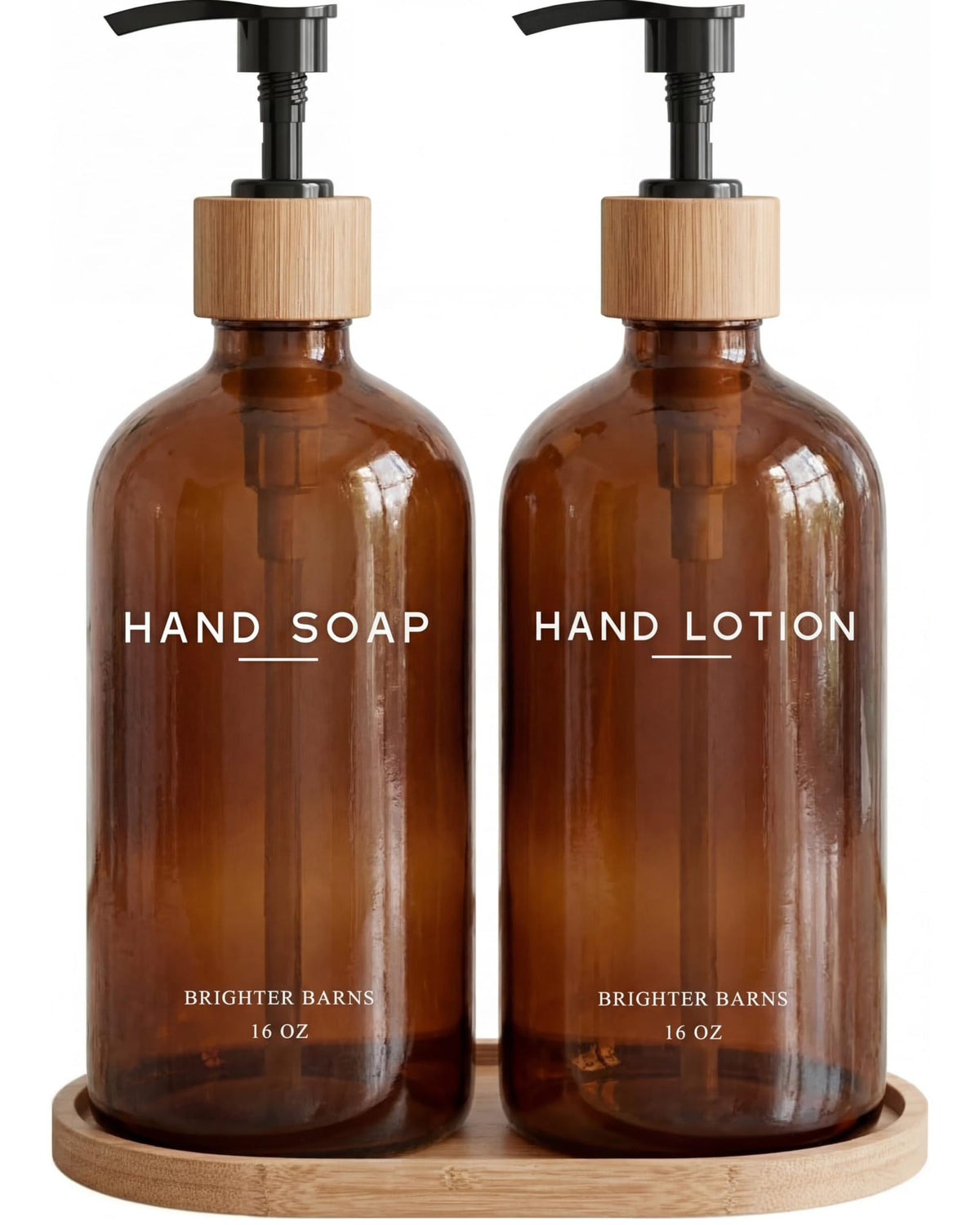 Brighter Barns amber glass soap dispenser with bamboo pump on a stylish bathroom counter.