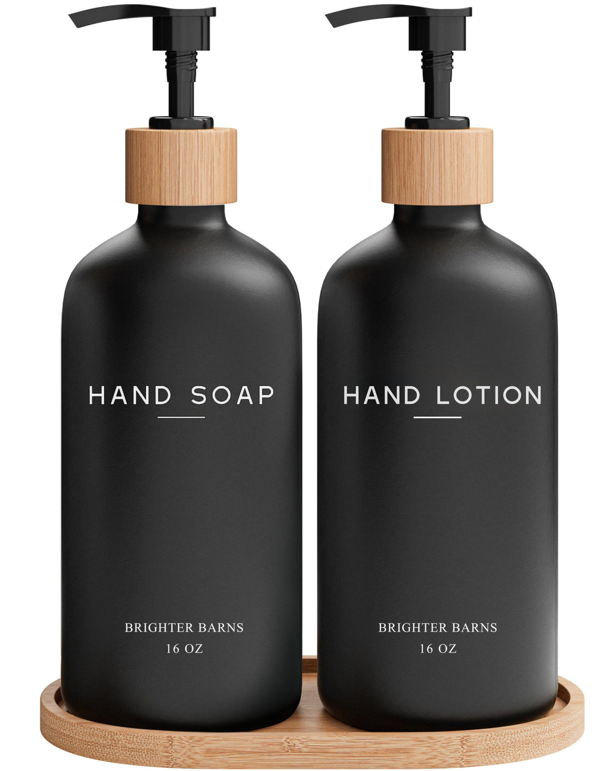 Brighter Barns black glass soap dispenser set on a sleek countertop for modern bathrooms.