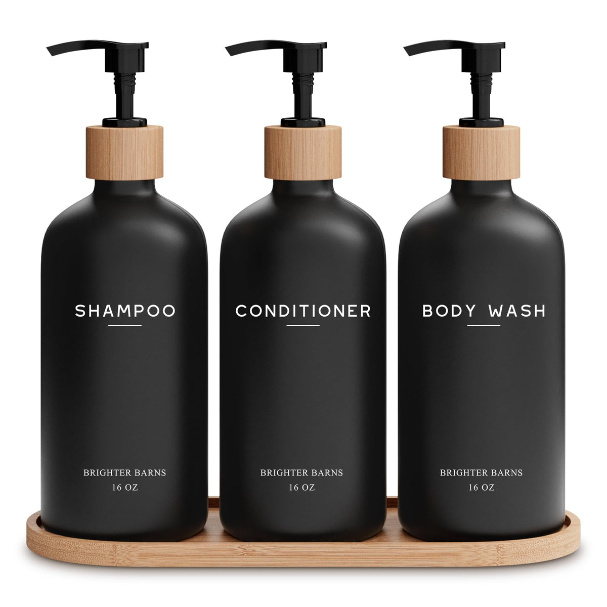 Brighter Barns black shampoo dispenser set bottles and pumps in a modern shower for clutter-free styling.