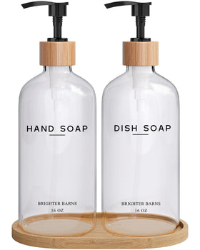 Brighter Barns clear glass hand soap dispenser with bamboo pump on sink.