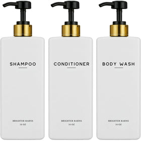 Brighter Barns white shampoo dispenser set with gold pumps for a chic bathroom upgrade.