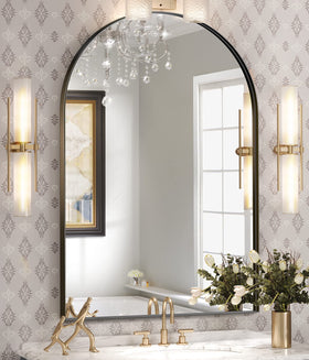 Brightify arched mirror with black metal frame enhances light and perceived space.