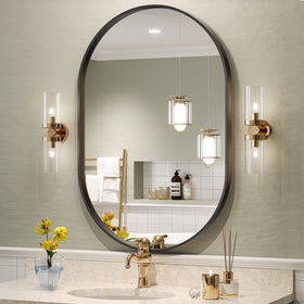 Brightify black oval mirror front view enhances bathroom vanity with modern appeal