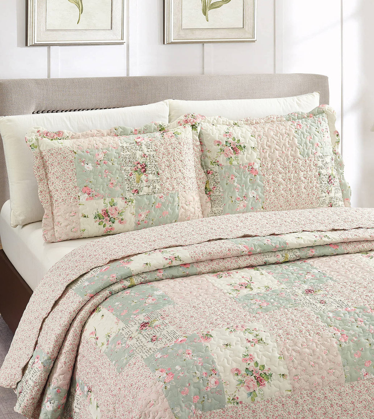 Brilliant Sunshine patchwork detail highlights rose buds in a timeless bedroom focal point.