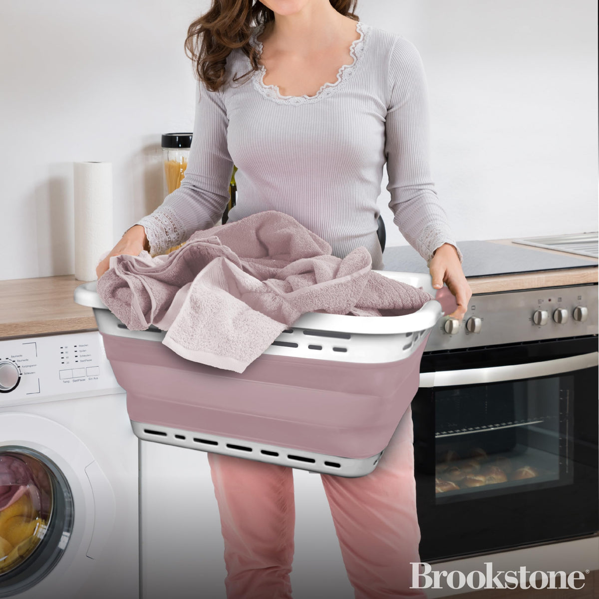 Brookstone 11 gallon XL collapsible basket expanded to hold a full load.