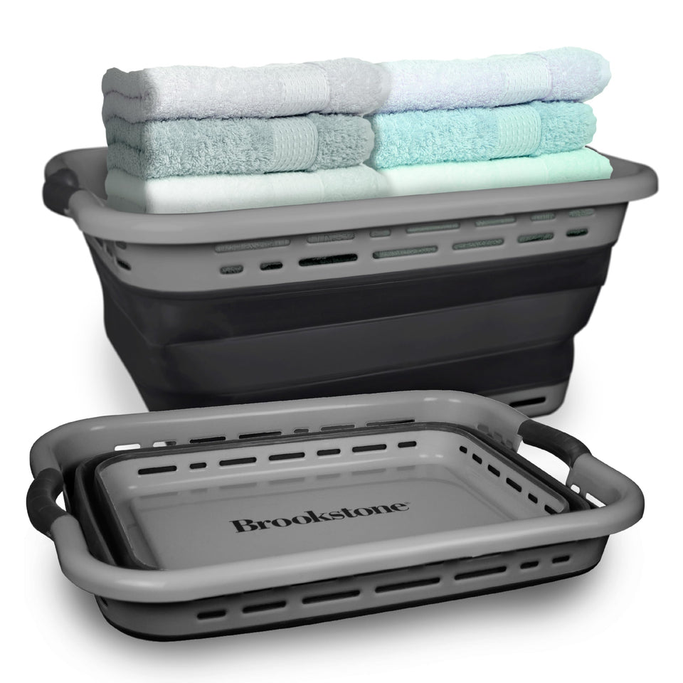 Brookstone 11gal XL collapsible basket folded for space-saving storage.