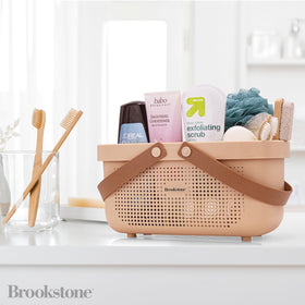 Brookstone BPA-free plastic caddy ensures safe storage for toiletries.
