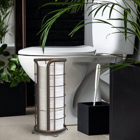 Brookstone bronze toilet paper stand with open-top storage for easy one-handed refills.
