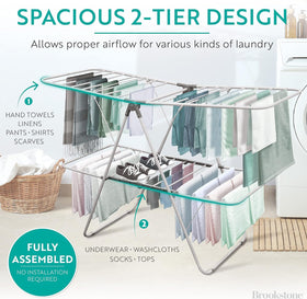 Brookstone foldable clothes drying rack folds flat for compact storage.