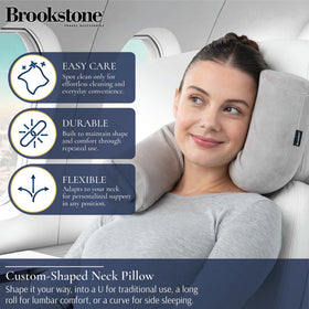 Brookstone Free Form Travel Pillow long-roll configuration provides lumbar comfort on long trips.