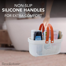 Brookstone shower caddy drainage holes keep items dry and organized.