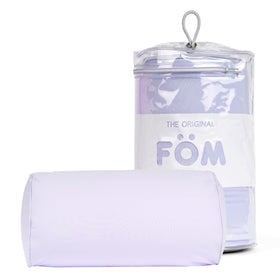 Brookstone Squishy FOM Cushion neck pillow in lilac supports comfortable travel and sleep.