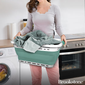Brookstone foldable laundry basket open ready for full loads.