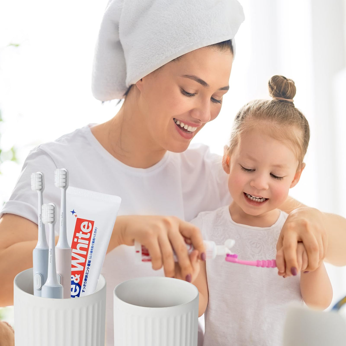 BSDISP bathroom tumbler cup set neatly holds brushes and toothpaste.