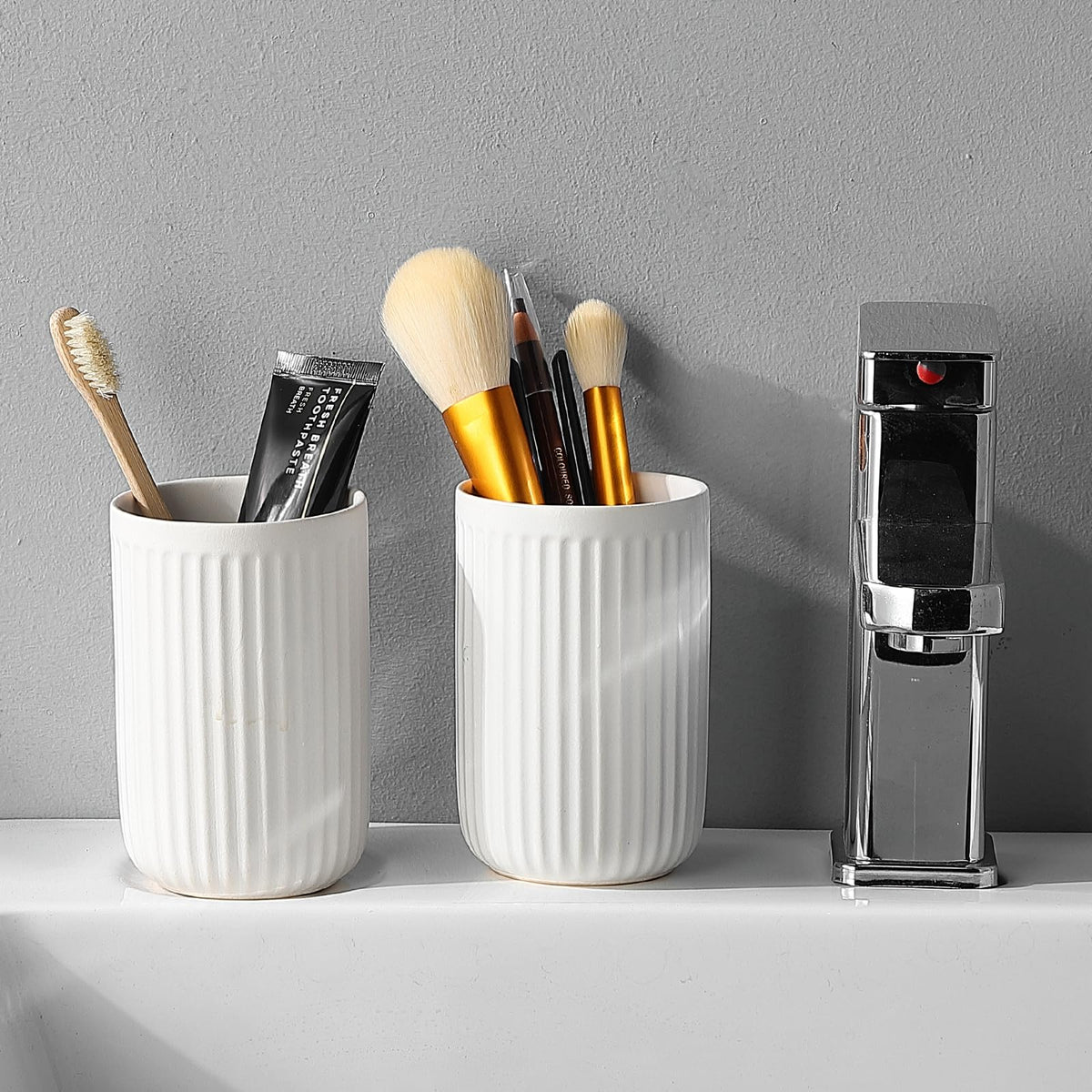 BSDISP pack of 2 toothbrush cups keeps counters tidy.