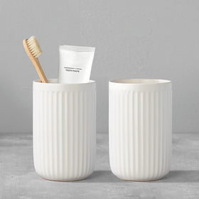 BSDISP white ceramic toothbrush holders with two cups for organized bathroom counter space.