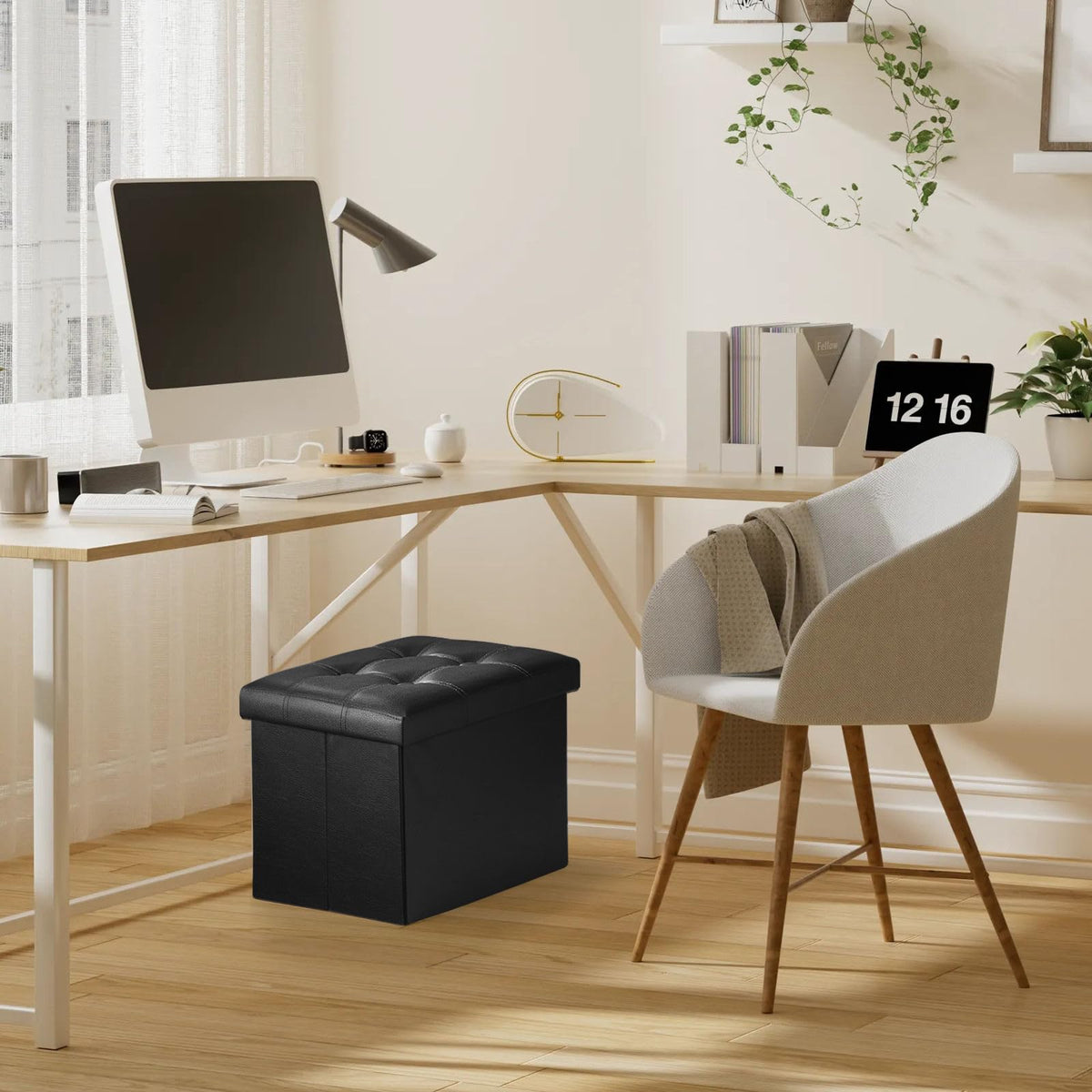 Bsketa storage ottoman in living room setting demonstrates versatile use.