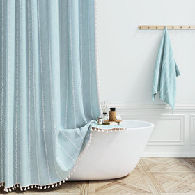 BTTN Boho Farmhouse shower curtain with tassel adds boutique style to your bathroom.