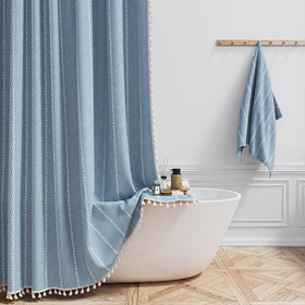 BTTN Boho Farmhouse shower curtain tassels blue add decorative fringe to bathroom.