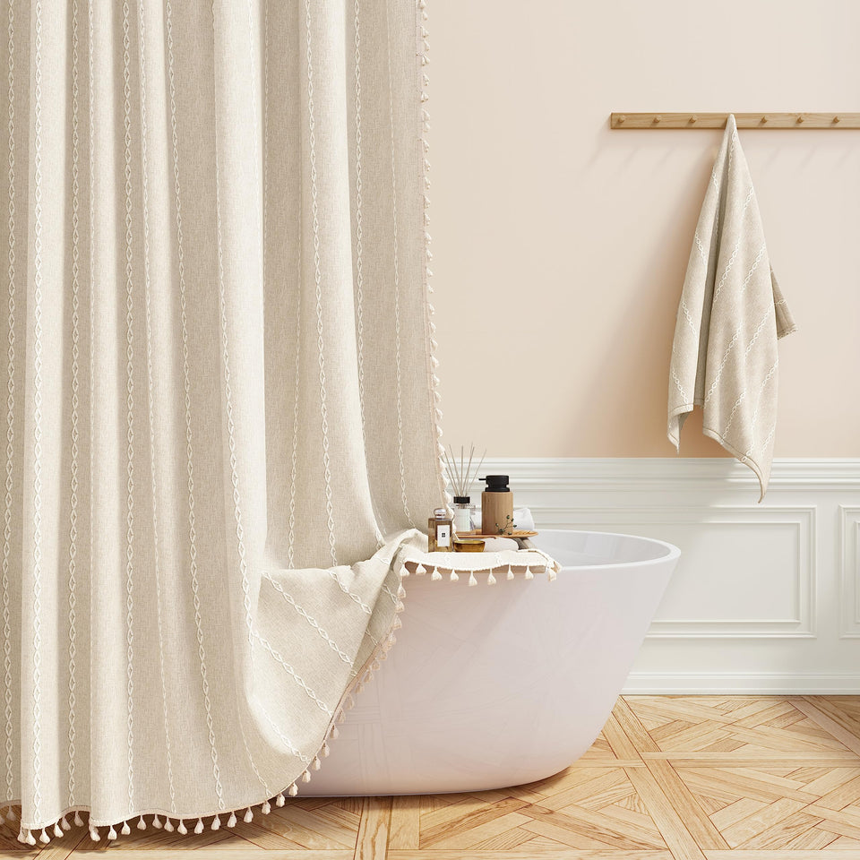 BTTN shower curtain with tassel embellishment adds boho farmhouse charm.