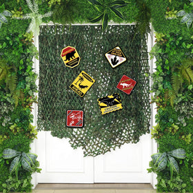 Bucherry dinosaur paper signs establish a cohesive theme across doors and windows.
