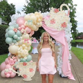 Bucherry tea party backdrop setup creates instant focal point