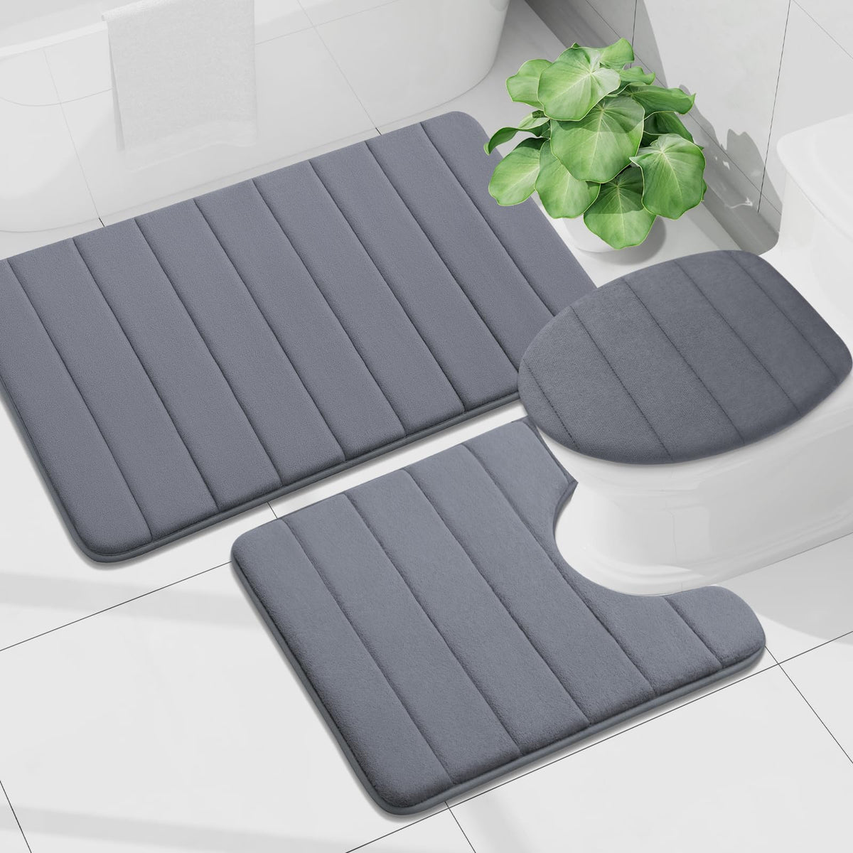 Buganda 30x20 bath mat fits most bathrooms with versatile dark grey finish