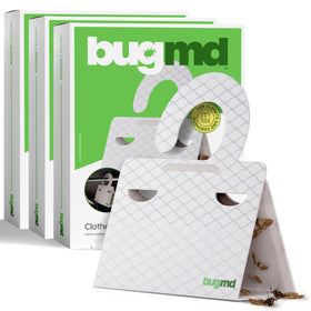 BugMD clothes moth traps visible in a closet, attracting and trapping moths